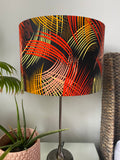 Double-sided 'Dark on Fire' Ankara print lampshade