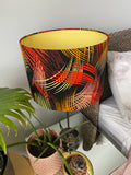 Double-sided 'Dark on Fire' Ankara print lampshade