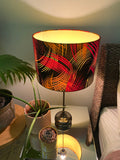 Double-sided 'Dark on Fire' Ankara print lampshade